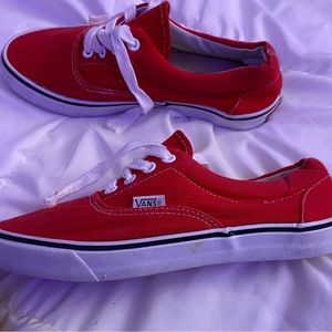 Red vans skate shoes. Hardly any damage. Close to new condition.